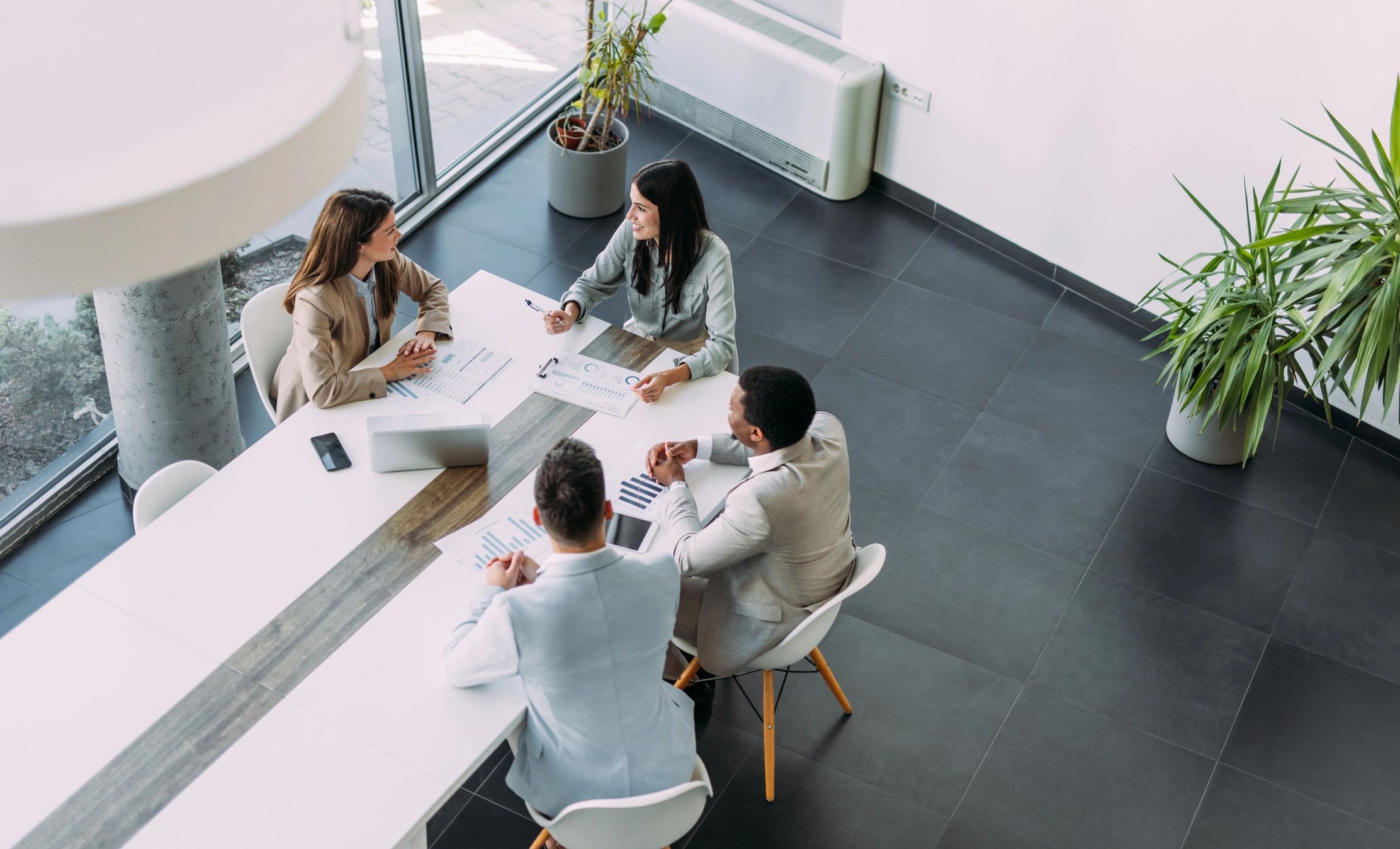 Business team reviewing strategy together